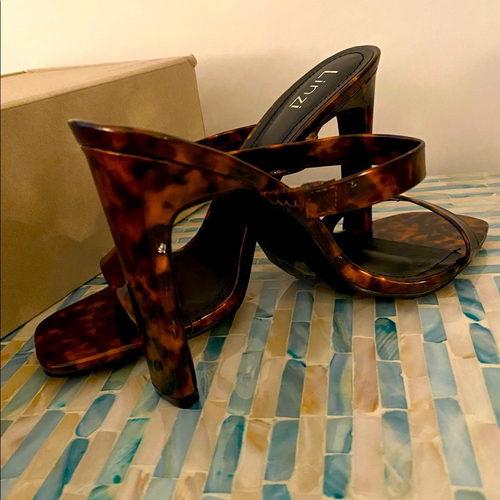 Linzi. Heel- mules. Size 9. New condition.
